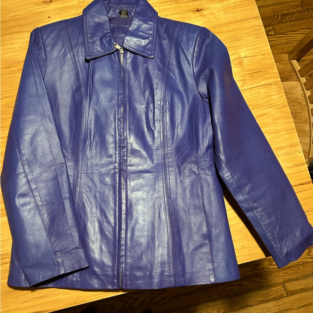 Pretty purple leather jacket, full front zipper. Petite medium.